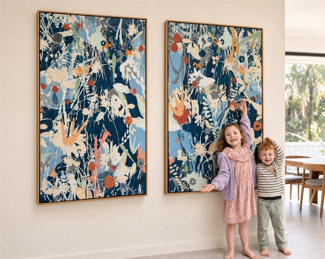 Two children standing beside their framed Keepsake Commission diptych